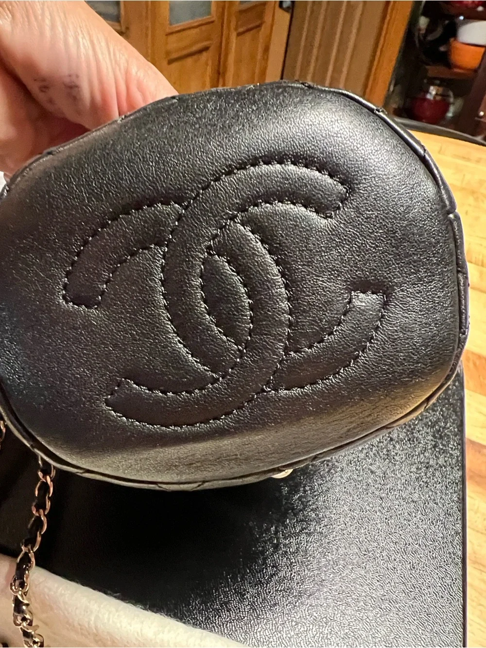 CHANEL About Pearls Black Quilted Pearl-Embellished Mini Lambskin Bucket Bag